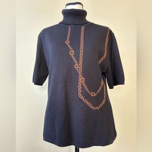 Angel Black and Orange Turtleneck Sweater